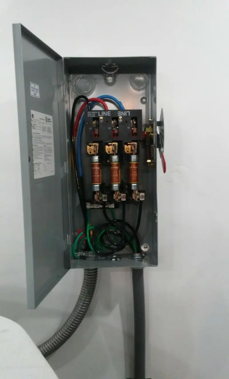 Three-phase disconnect switch installed for Smoke Detector Installation in Pine Island